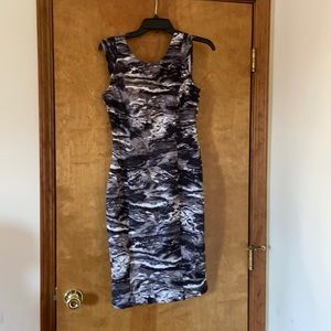 Brand new, never worn Jennifer Lopez dress. Size 2.